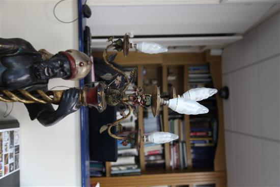 A pair of painted and giltwood blackamoor torcheres, H.6ft